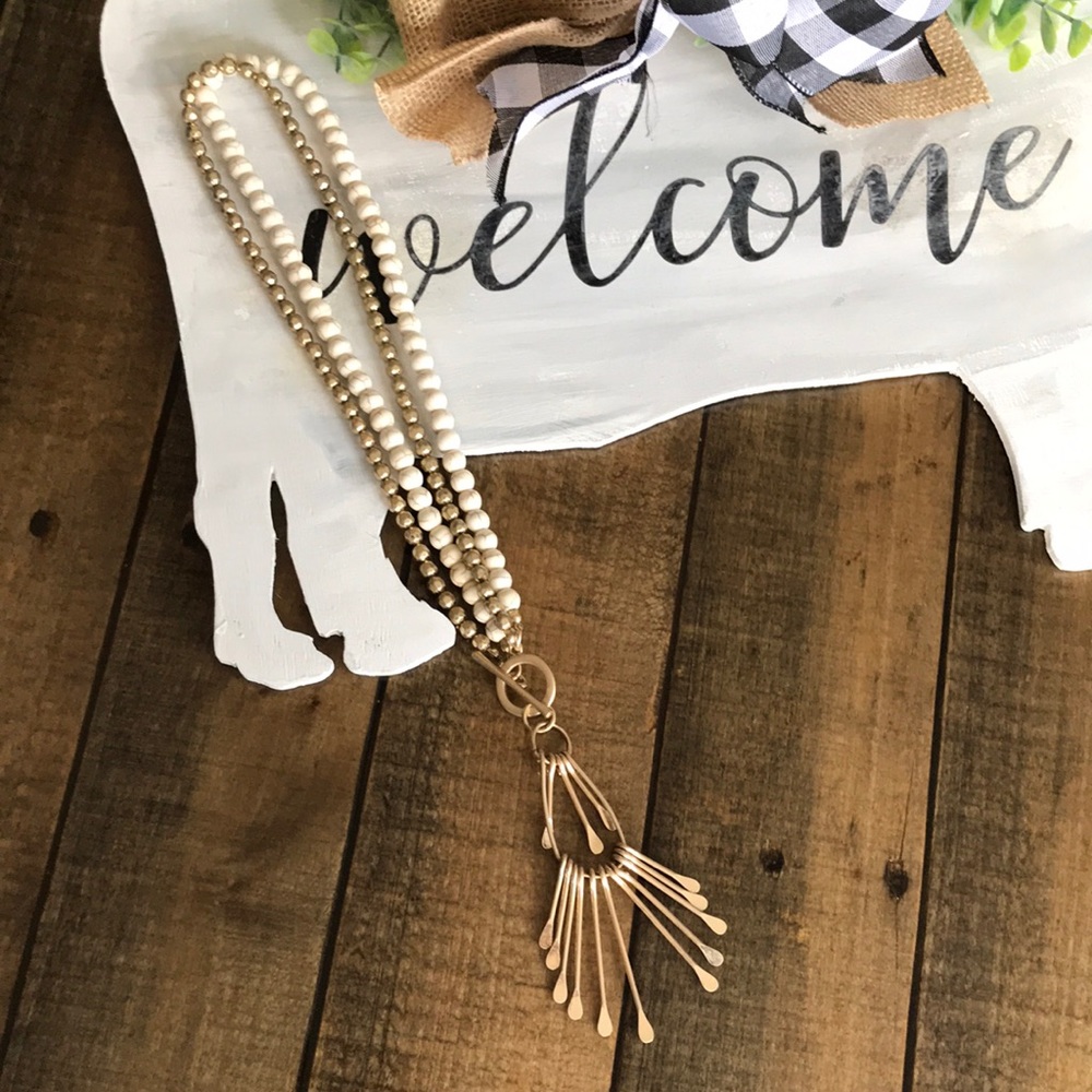 White and gold necklace